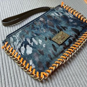 GUESS clutch with unique orange PVC trim